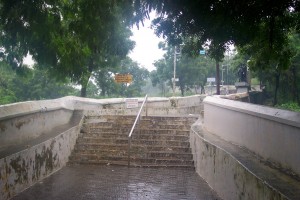 Once you pass through the arch portal, you climb up stone steps like these. On the sides, one can see sculptures of the various Stations of the Cross. One such sculpture is visible on the right side in this picture.