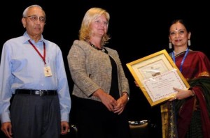 Susan Tuller, Deputy Consular General, Consulate General of United States, in Chennai, presenting the title to Bharatanatyam exponent Malavika Sarukkai at The Music Academy’s 11th dance festival. Academy president N. Murali is in the picture.  